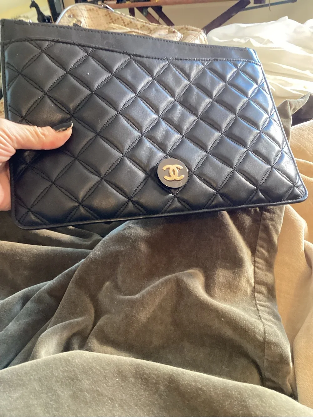 Chanel Quilted Leather Clutch Wristlet in Black with Gold CC Emblem